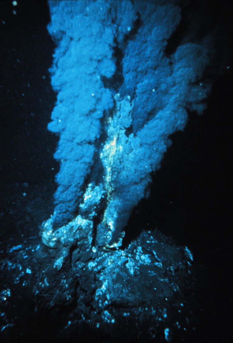 A black smoker hydrothermal vent releasing a dark plume on the Mid-Atlantic Ridge